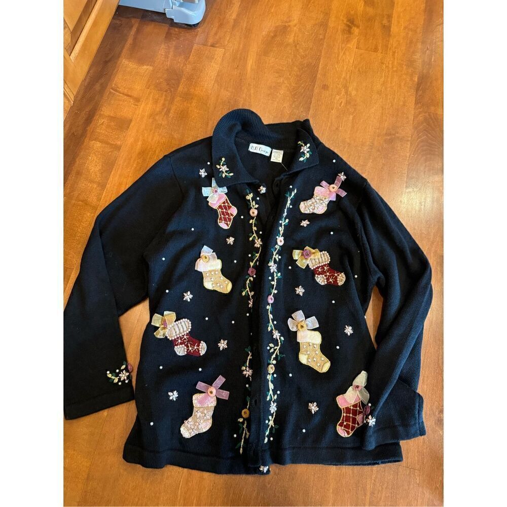 Woman’s ugly BP design Christmas cardigan